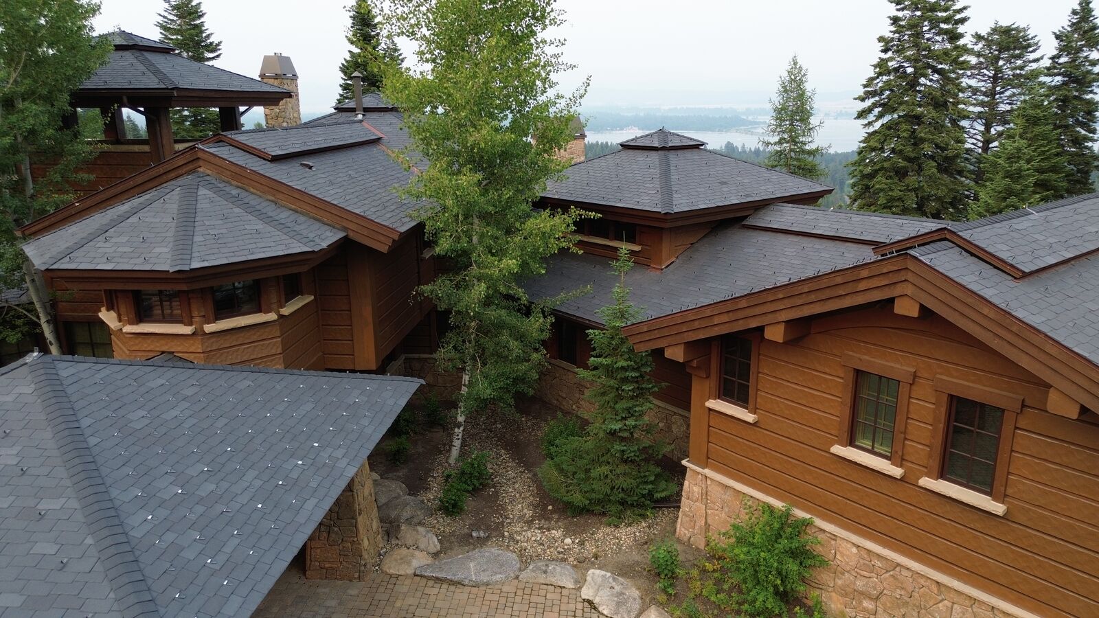 Luxury log estate with lake views in McCall Idaho — Blue Goat Roofing