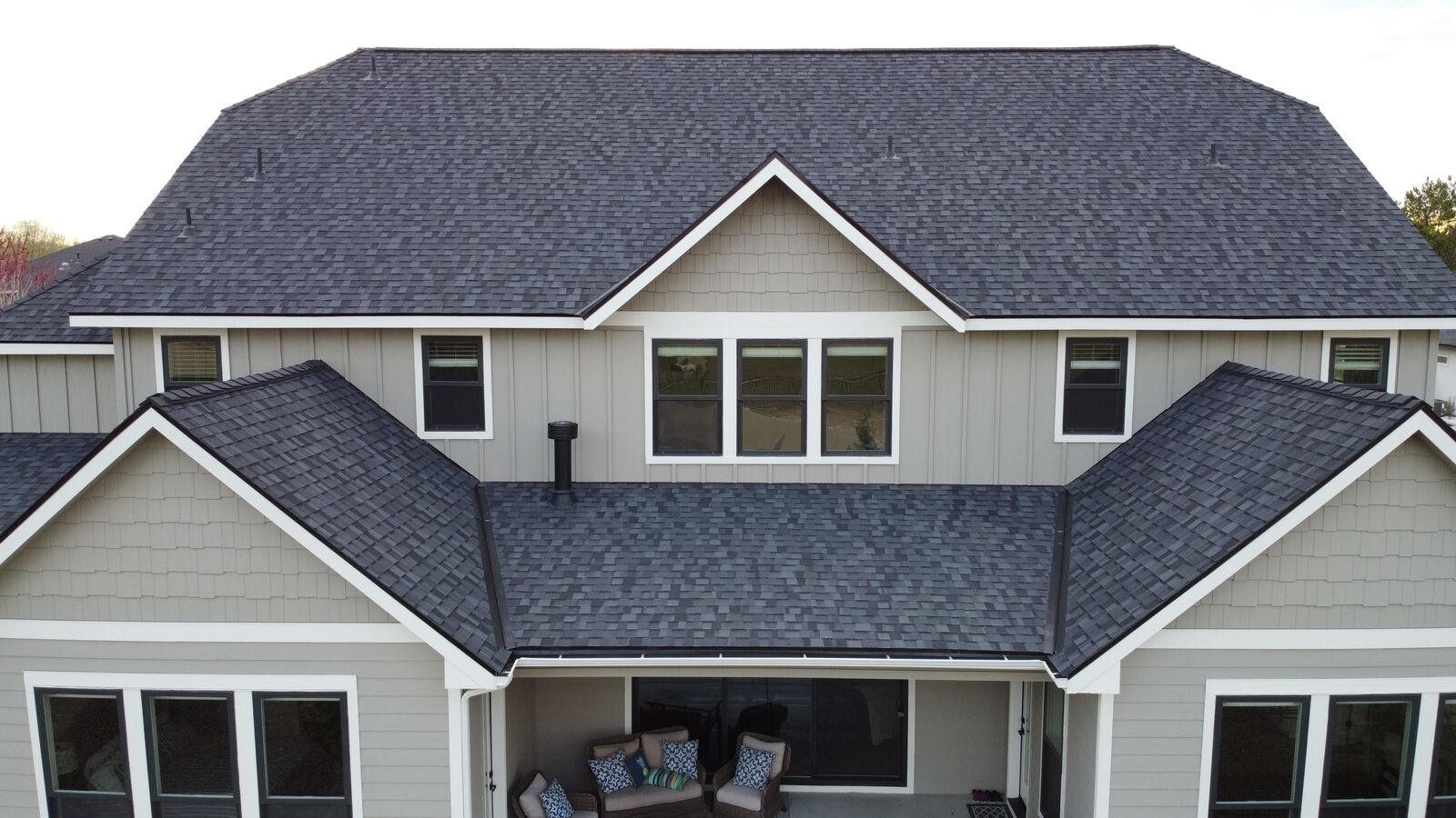 Craftsman home with dark charcoal shingle roof in Meridian Idaho